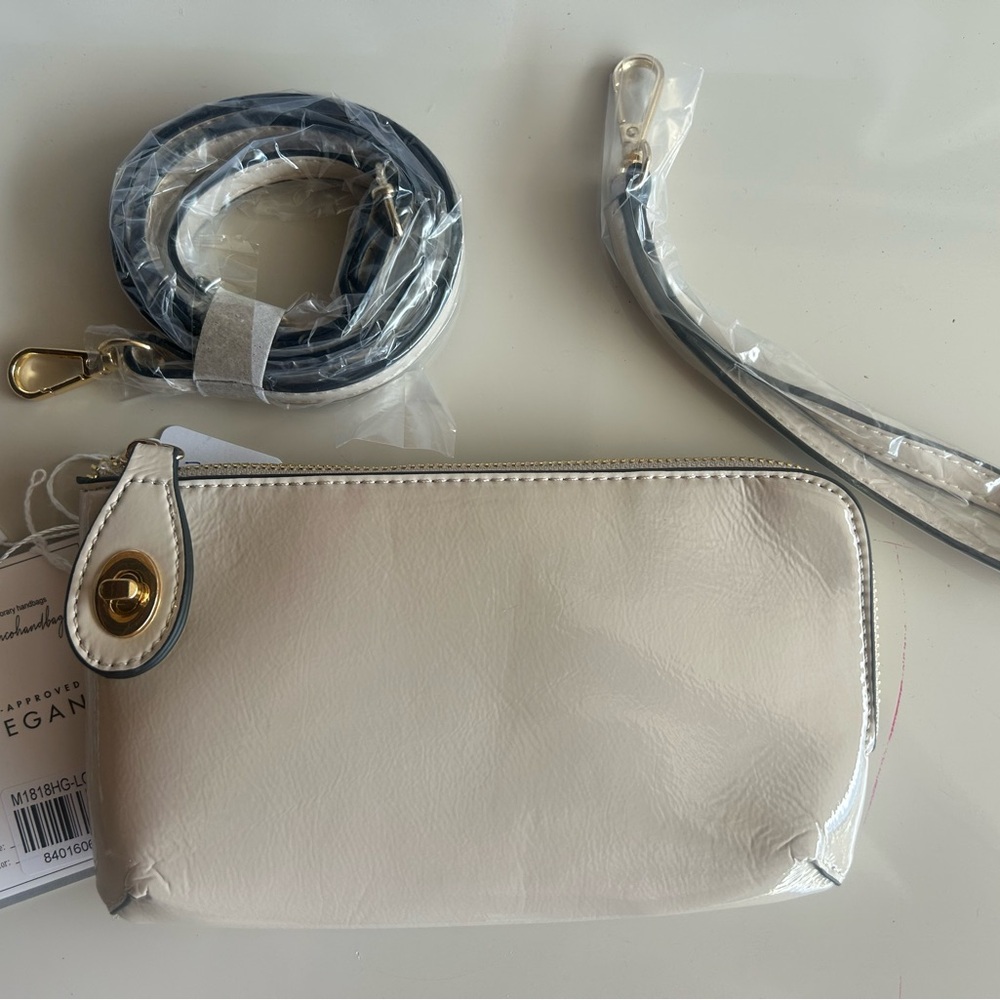 Chic Cream Leather Wristlet by [Brand]